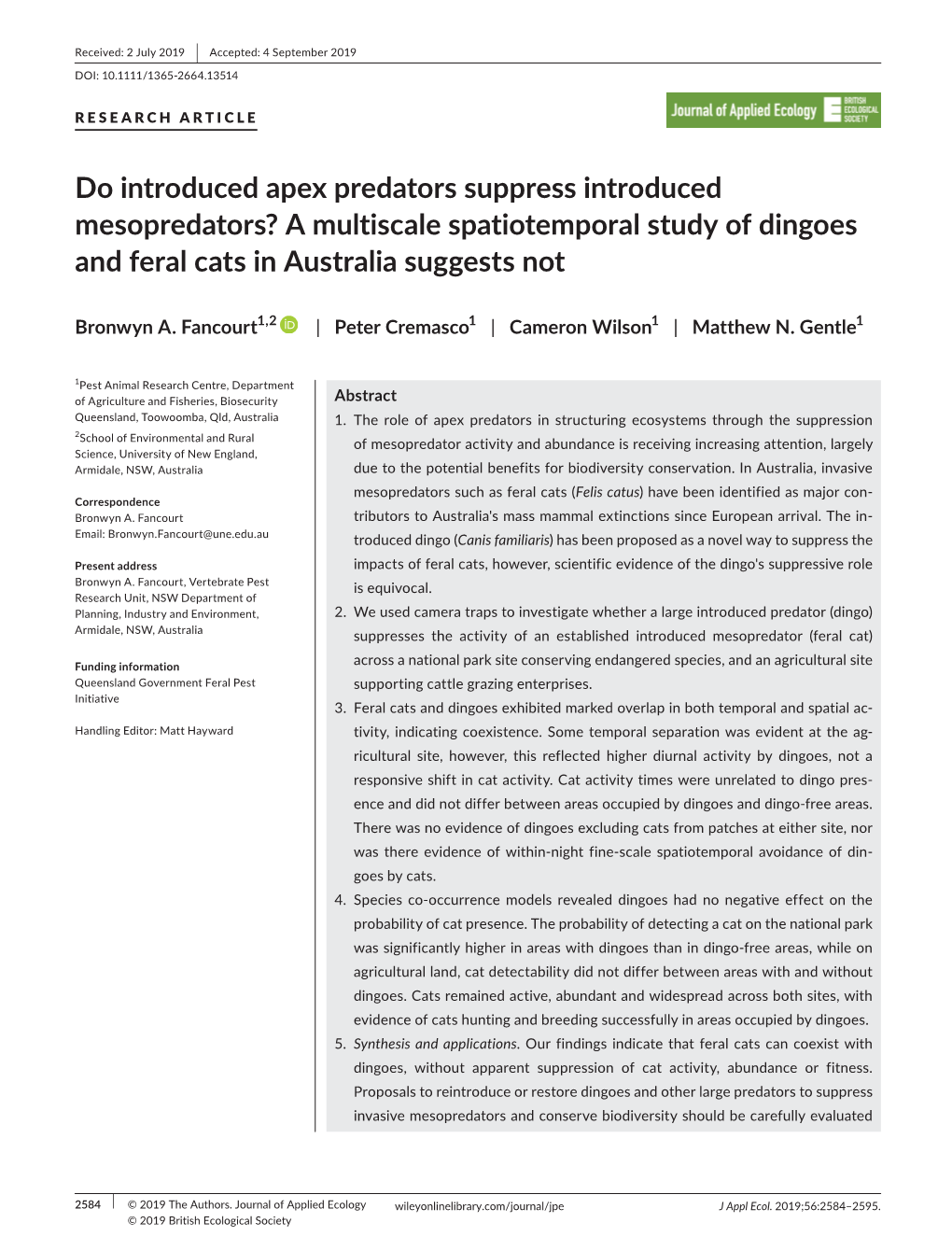 A Multiscale Spatiotemporal Study of Dingoes and Feral Cats in Australia Suggests Not