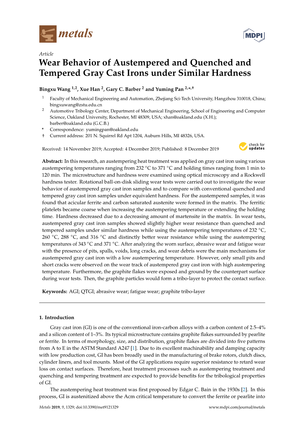 Wear Behavior of Austempered and Quenched and Tempered Gray Cast Irons Under Similar Hardness