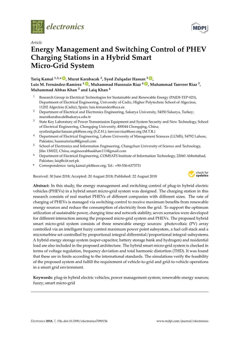 Energy Management and Switching Control of PHEV Charging Stations in a Hybrid Smart Micro-Grid System
