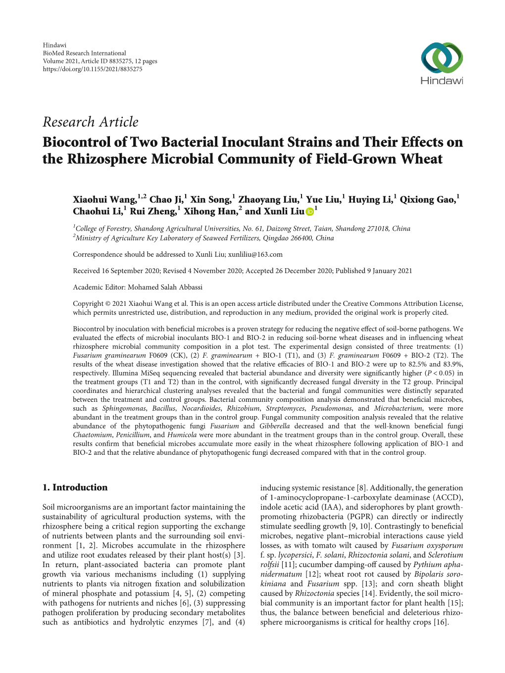 Biocontrol of Two Bacterial Inoculant Strains and Their Effects on the Rhizosphere Microbial Community of Field-Grown Wheat