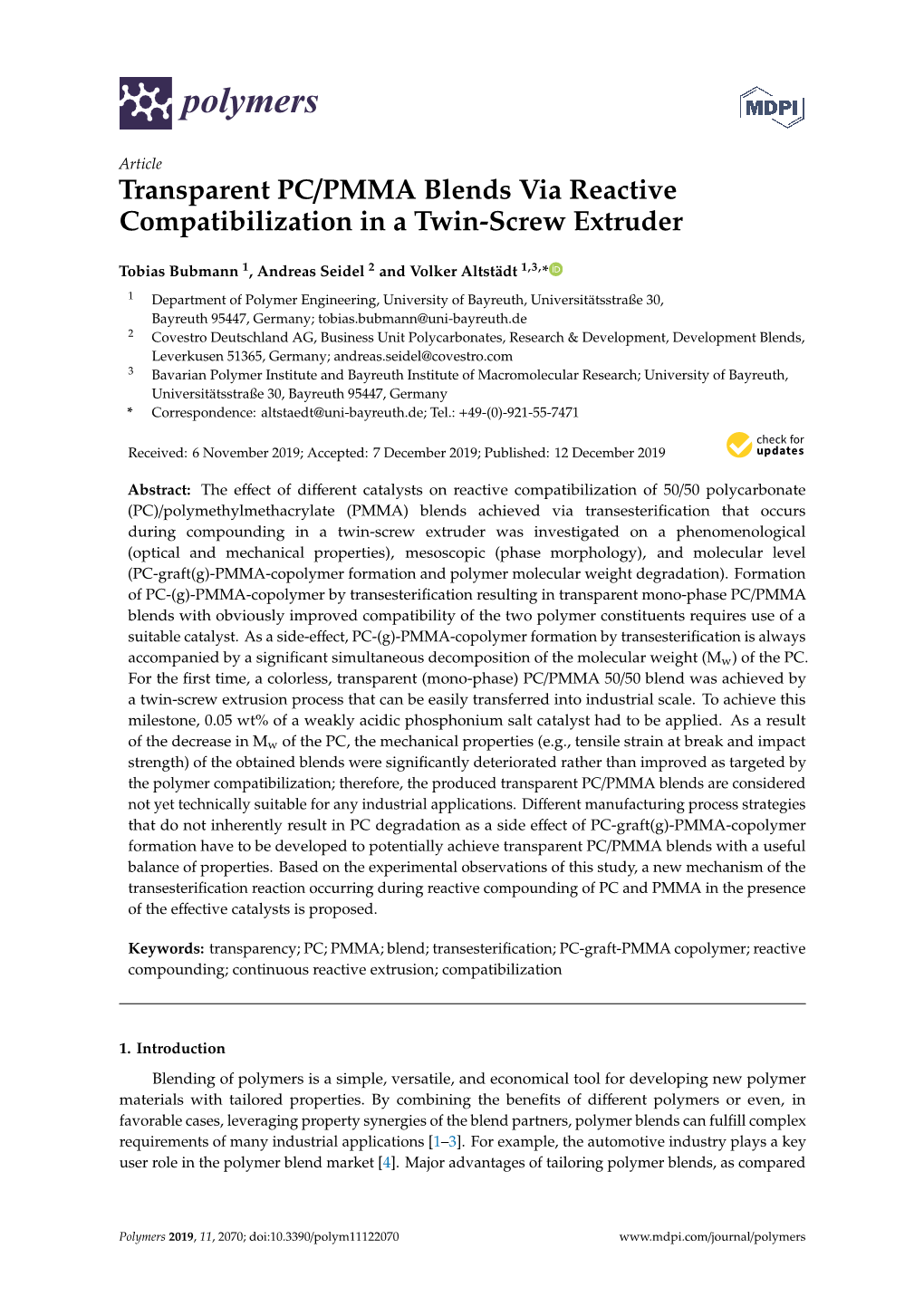 Transparent PC/PMMA Blends Via Reactive Compatibilization in a Twin-Screw Extruder