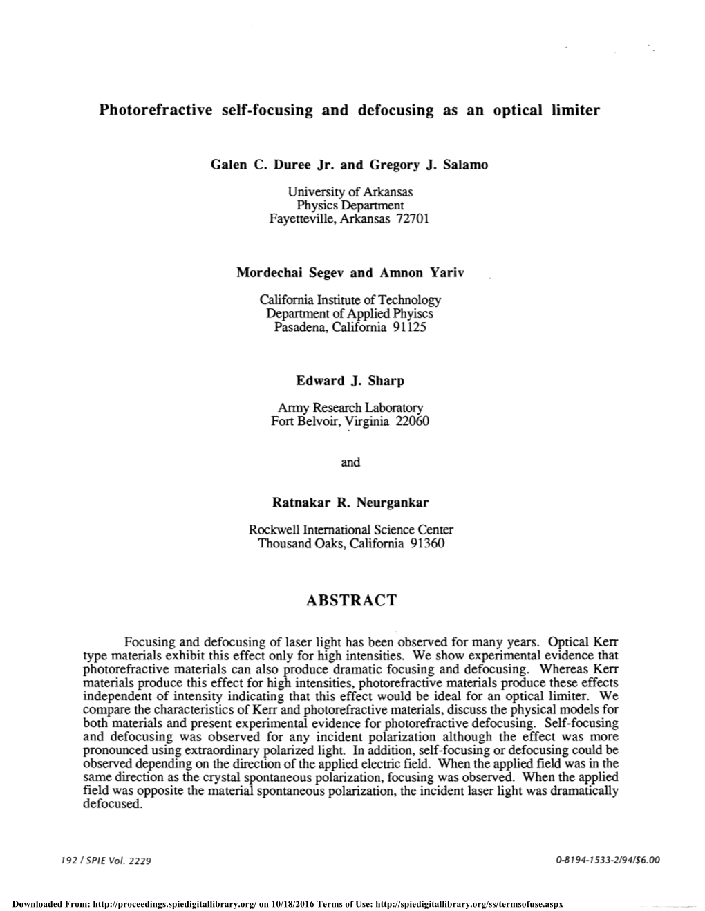 Photorefractive Self-Focusing and Defocusing As an Optical Limiter