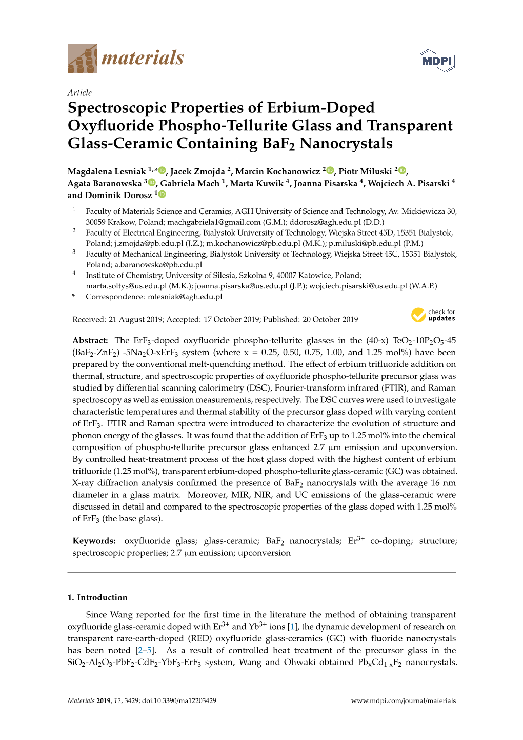 Spectroscopic Properties of Erbium-Doped Oxyfluoride Phospho-Tellurite Glass and Transparent Glass-Ceramic Containing Baf2 Nanoc