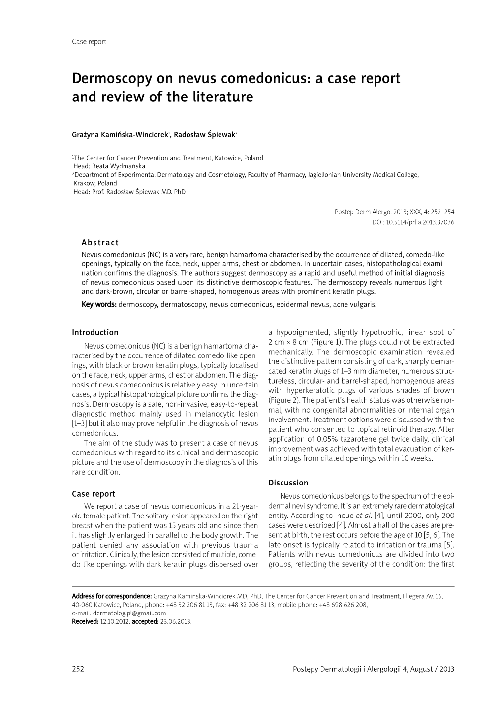 Dermoscopy on Nevus Comedonicus: a Case Report and Review of the Literature