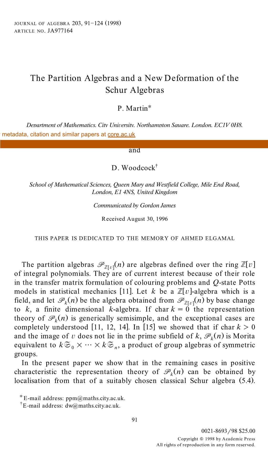 The Partition Algebras and a New Deformation of the Schur Algebras