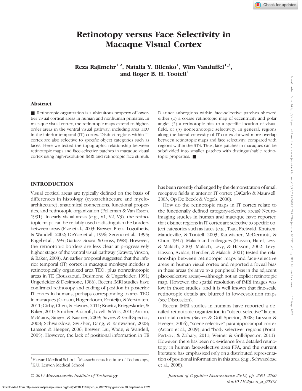 Retinotopy Versus Face Selectivity in Macaque Visual Cortex