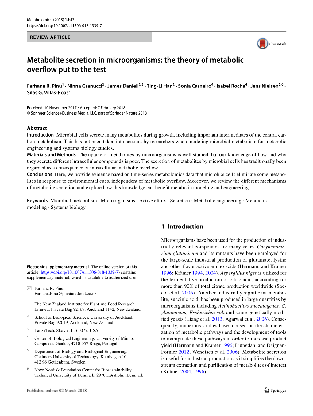 Metabolite Secretion in Microorganisms: the Theory of Metabolic Overflow Put to the Test