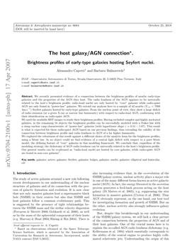 The Host Galaxy/AGN Connection. Brightness Profiles of Early-Type Galaxies Hosting Seyfert Nuclei