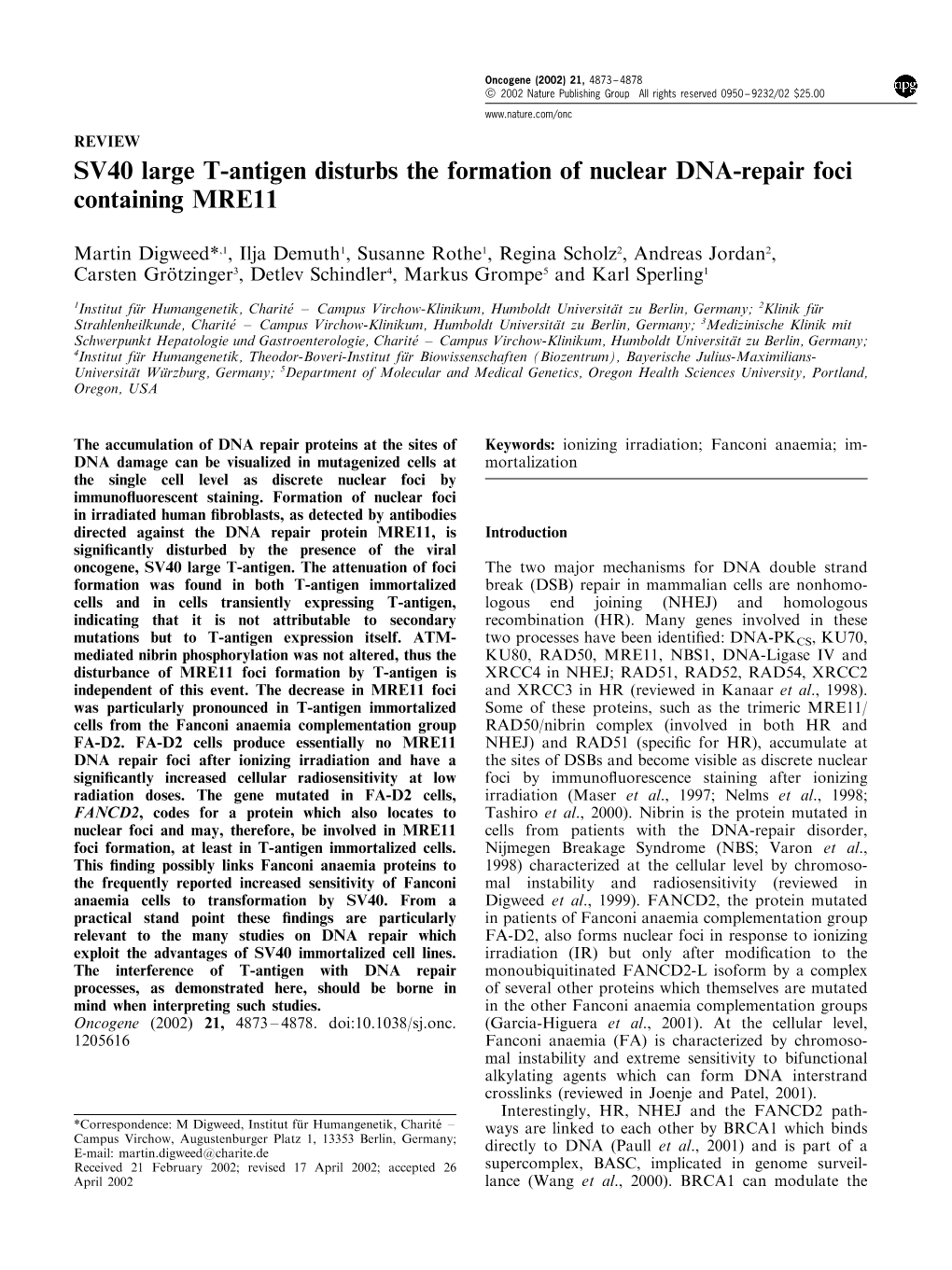 SV40 Large T-Antigen Disturbs the Formation of Nuclear DNA-Repair Foci Containing MRE11