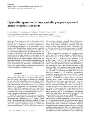 Light-Shift Suppression in Laser Optically Pumped Vapour-Cell Atomic Frequency Standards