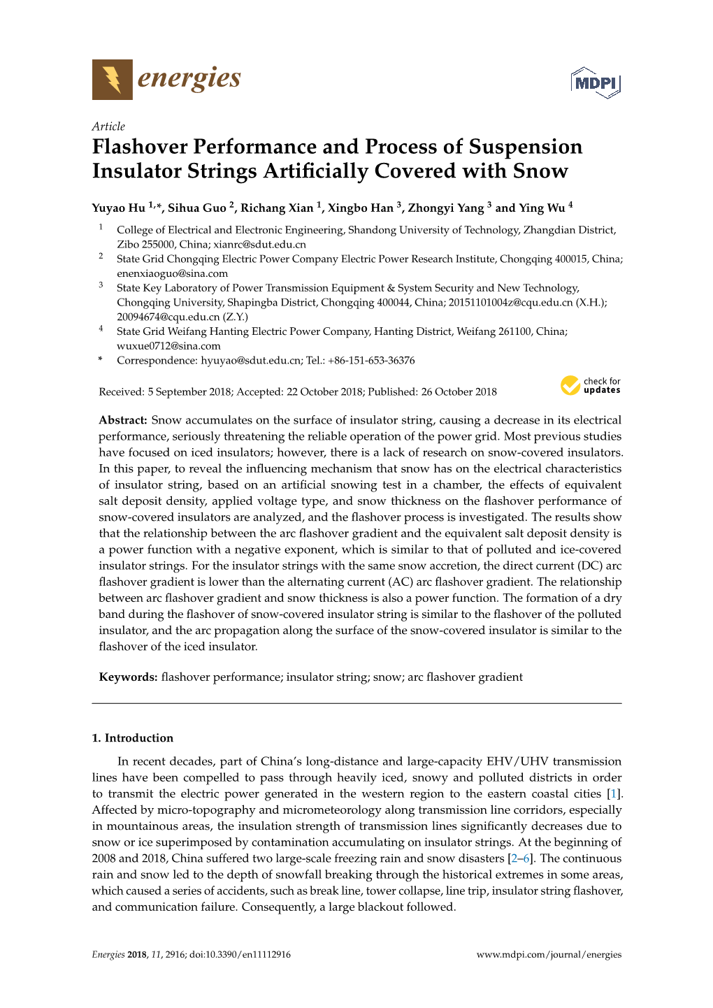 Flashover Performance and Process of Suspension Insulator Strings Artiﬁcially Covered with Snow