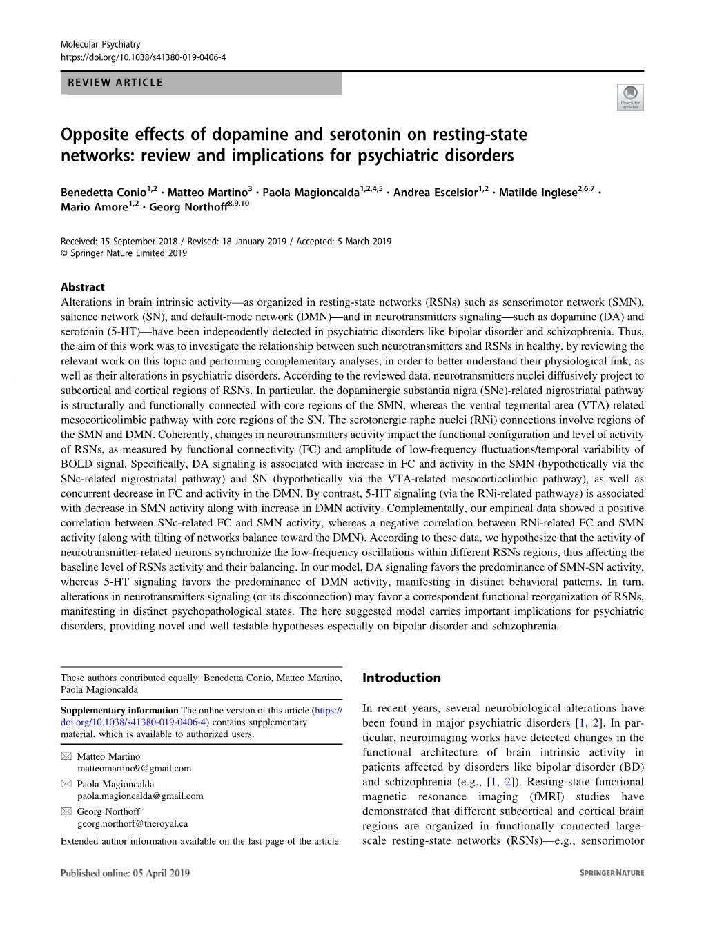 Opposite Effects of Dopamine and Serotonin on Resting-State Networks: Review and Implications for Psychiatric Disorders