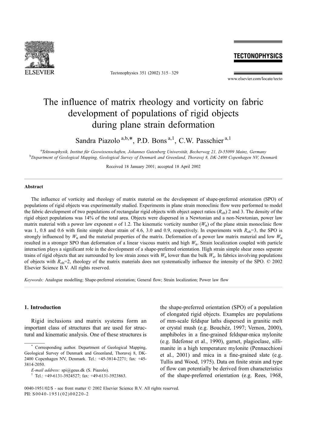 The Influence of Matrix Rheology and Vorticity on Fabric Development of Populations of Rigid Objects During Plane Strain Deformation