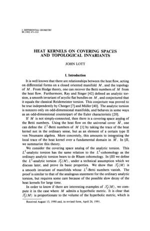 Heat Kernels on Covering Spaces and Topological Invariants
