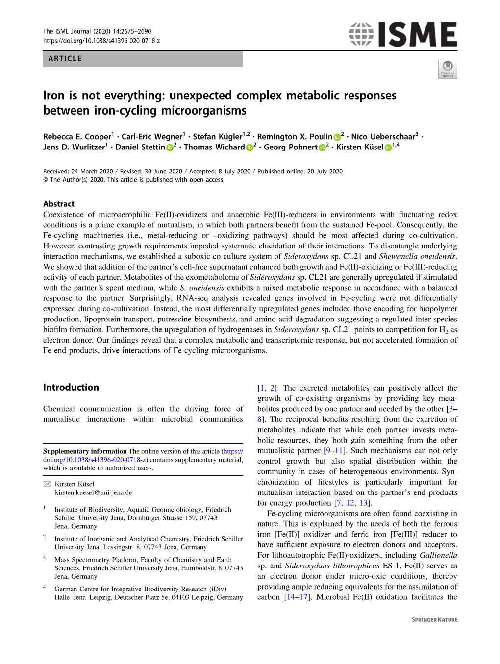 Unexpected Complex Metabolic Responses Between Iron-Cycling Microorganisms