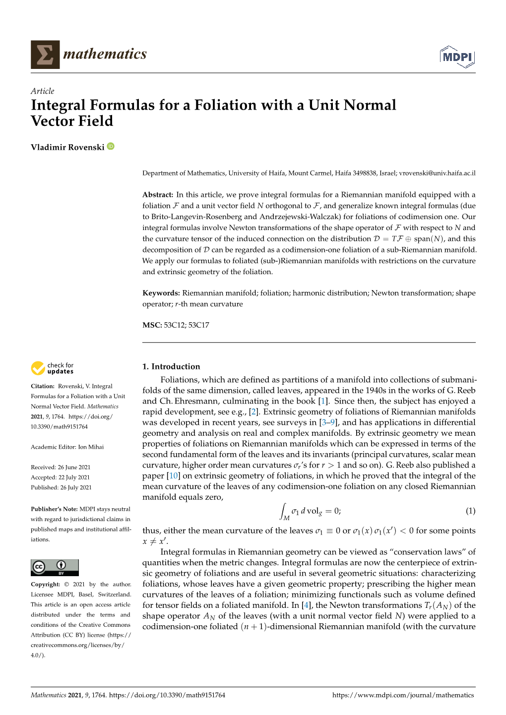 Integral Formulas for a Foliation with a Unit Normal Vector Field