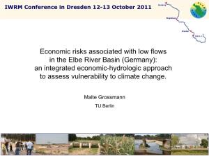 Economic Risks Associated with Low Flows in the Elbe River Basin (Germany): an Integrated Economic-Hydrologic Approach to Assess Vulnerability to Climate Change