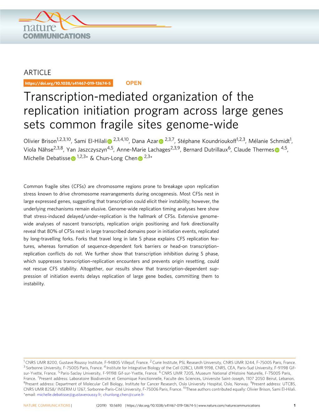 Transcription-Mediated Organization of the Replication Initiation Program Across Large Genes Sets Common Fragile Sites Genome-Wide