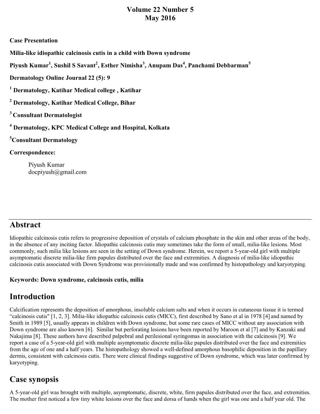 Milia Like Idiopathic Calcinosis Cutis in a Child with Down Syndrome