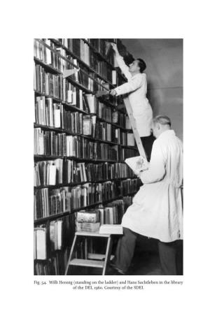 Fig. 54. Willi Hennig (Standing on the Ladder) and Hans Sachtleben in the Library of the DEI, 1960