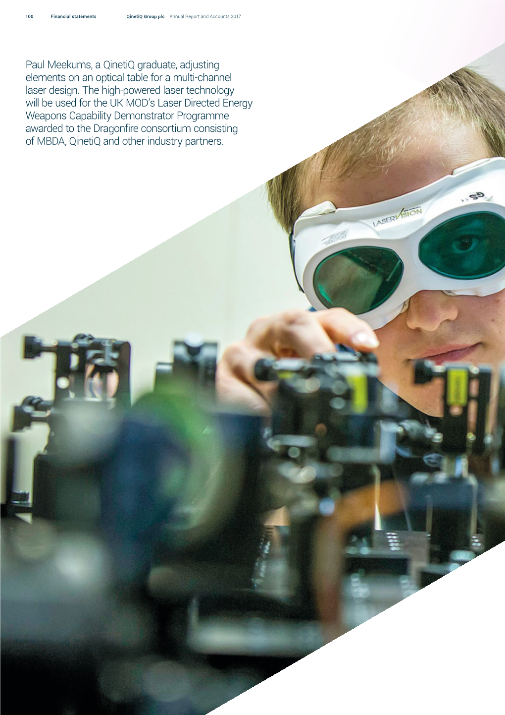 Paul Meekums, a Qinetiq Graduate, Adjusting Elements on an Optical Table for a Multi-Channel Laser Design