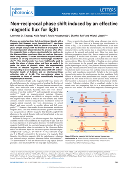 Non-Reciprocal Phase Shift Induced by an Effective Magnetic Flux for Light