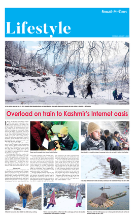 In This Picture Taken on Dec 21, 2019, Students Bhat Musaddiq Reyaz and Aqeel Mukhtar Along with Others Walk Towards the Train Station in Banihal