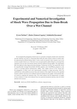 Experimental and Numerical Investigation of Shock Wave Propagation Due to Dam-Break Over a Wet Channel
