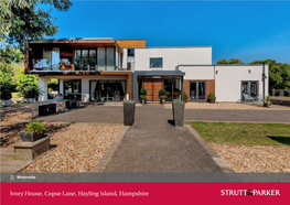 Ivory House, Copse Lane, Hayling Island, Hampshire Ivory House Integrated Appliances and Glass Work Surfaces That Appear to ‘Float’ on Top of a Huge Island