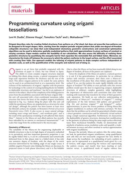 Programming Curvature Using Origami Tessellations