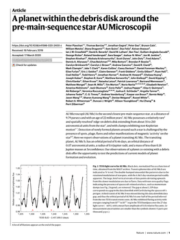 A Planet Within the Debris Disk Around the Pre-Main-Sequence Star AU Microscopii