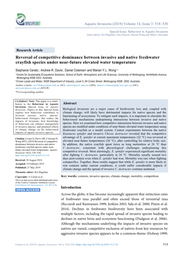 Reversal of Competitive Dominance Between Invasive and Native Freshwater Crayfish Species Under Near-Future Elevated Water Temperature