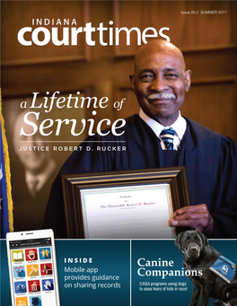 Canine Companions for CASA 18 Justice Robert Rucker Smiles During His Retirement Ceremony in the Indiana Supreme Court Courtroom