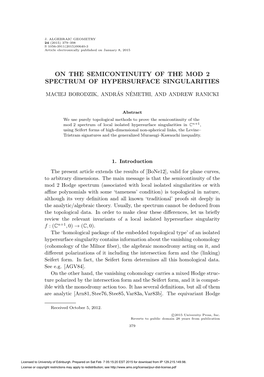 On the Semicontinuity of the Mod 2 Spectrum of Hypersurface Singularities