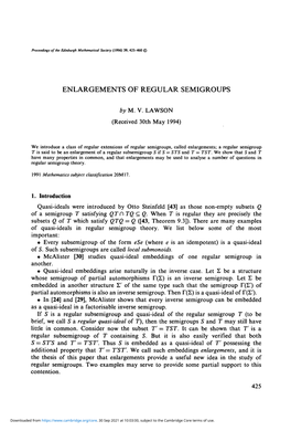 Enlargements of Regular Semigroups