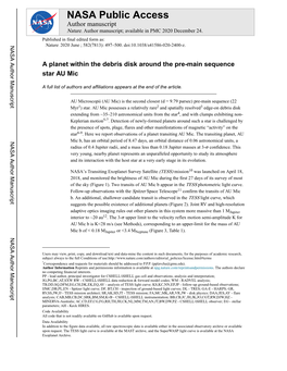 A Planet Within the Debris Disk Around the Pre-Main Sequence Star AU Mic