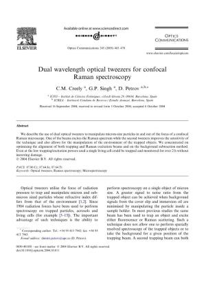 Dual Wavelength Optical Tweezers for Confocal Raman Spectroscopy