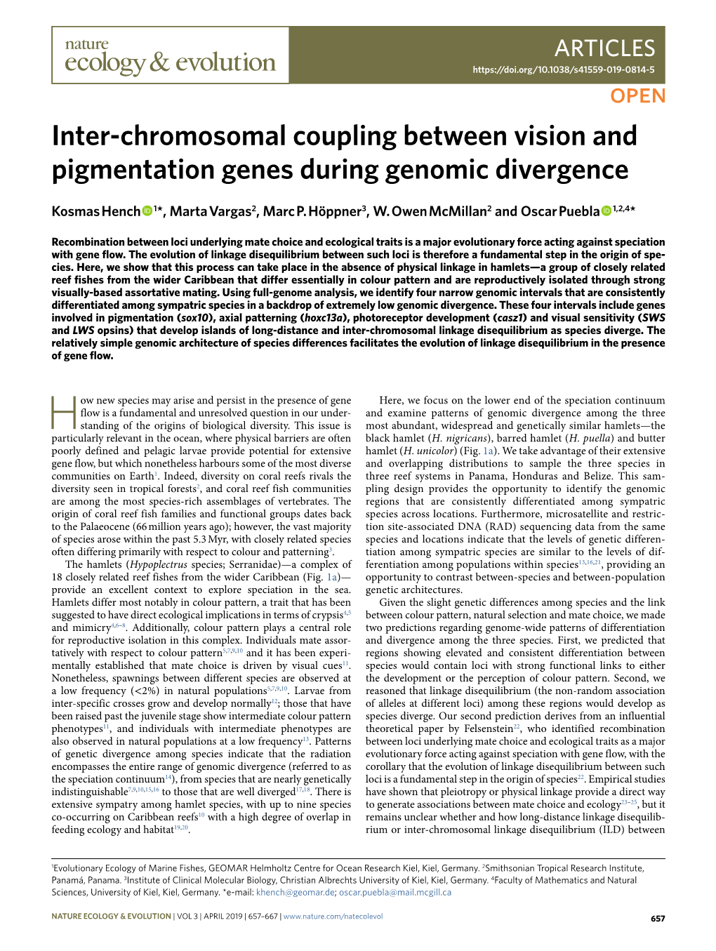 Inter-Chromosomal Coupling Between Vision and Pigmentation Genes During Genomic Divergence