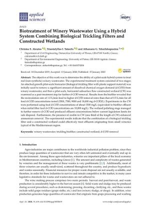 Biotreatment of Winery Wastewater Using a Hybrid System Combining Biological Trickling Filters and Constructed Wetlands