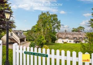 Piddle Meadow Athelhampton, Dorset Piddle Meadow Athelhampton • Dorchester • Dorset • DT2 7LG