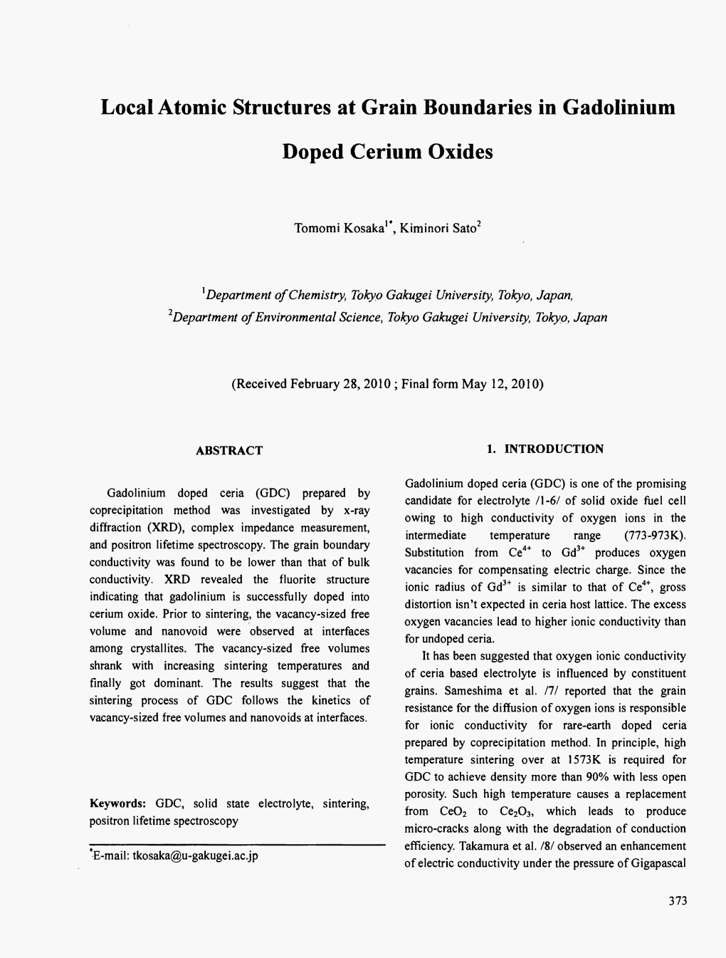 Local Atomic Structures at Grain Boundaries in Gadolinium Doped