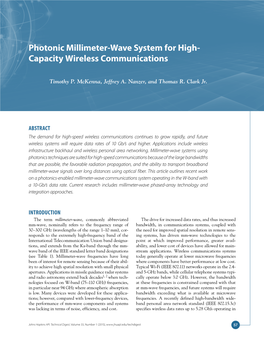 Photonic Millimeter-Wave System for High-Capacity Wireless