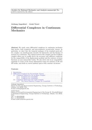 Differential Complexes in Continuum Mechanics
