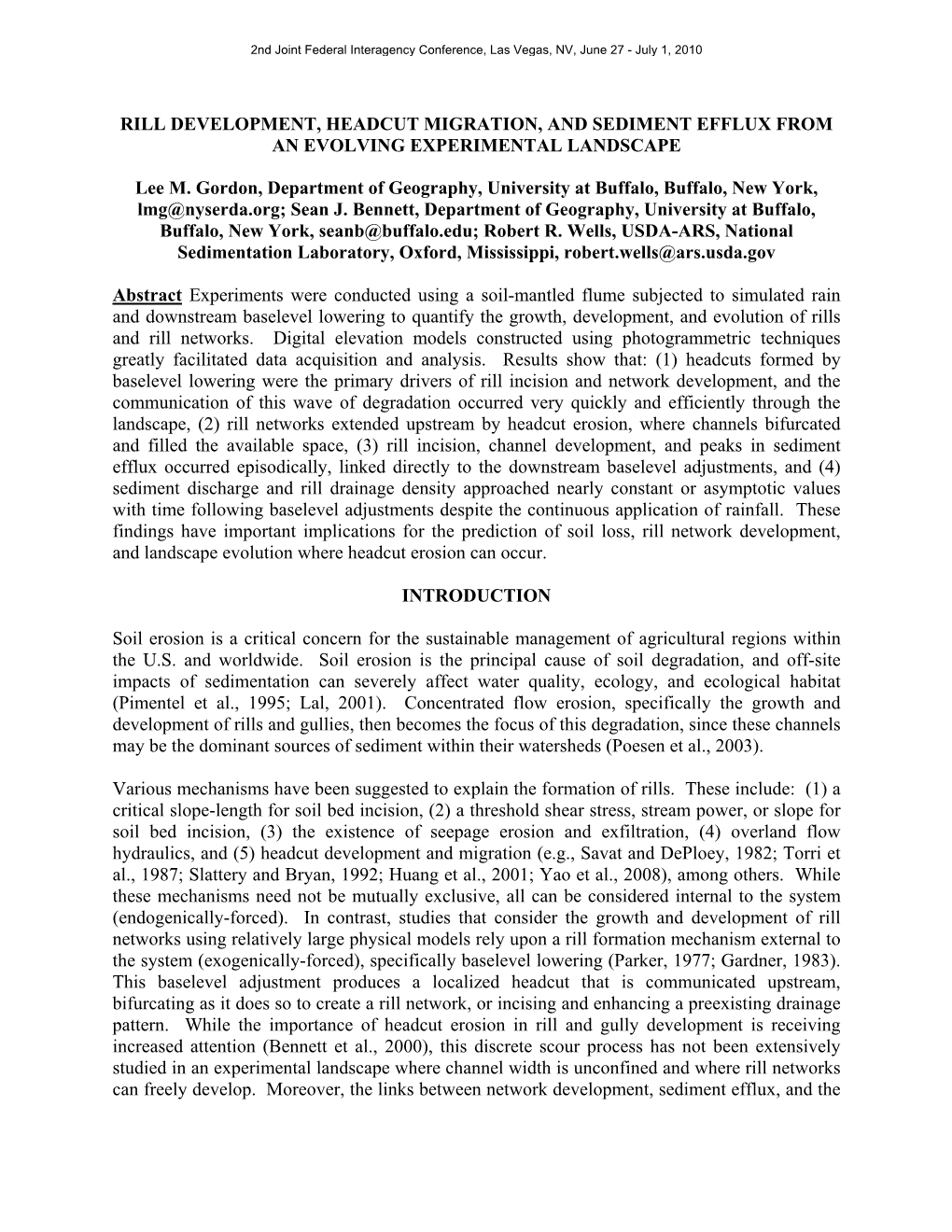 Rill Development, Headcut Migration, and Sediment Efflux from an Evolving Experimental Landscape