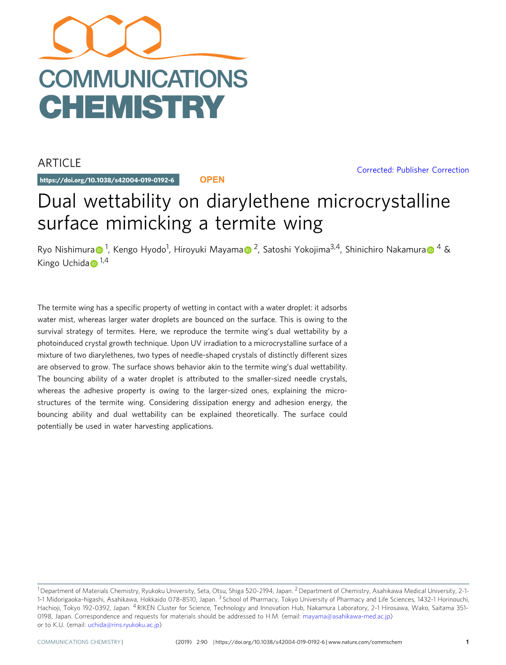 Dual Wettability on Diarylethene Microcrystalline Surface Mimicking a Termite Wing