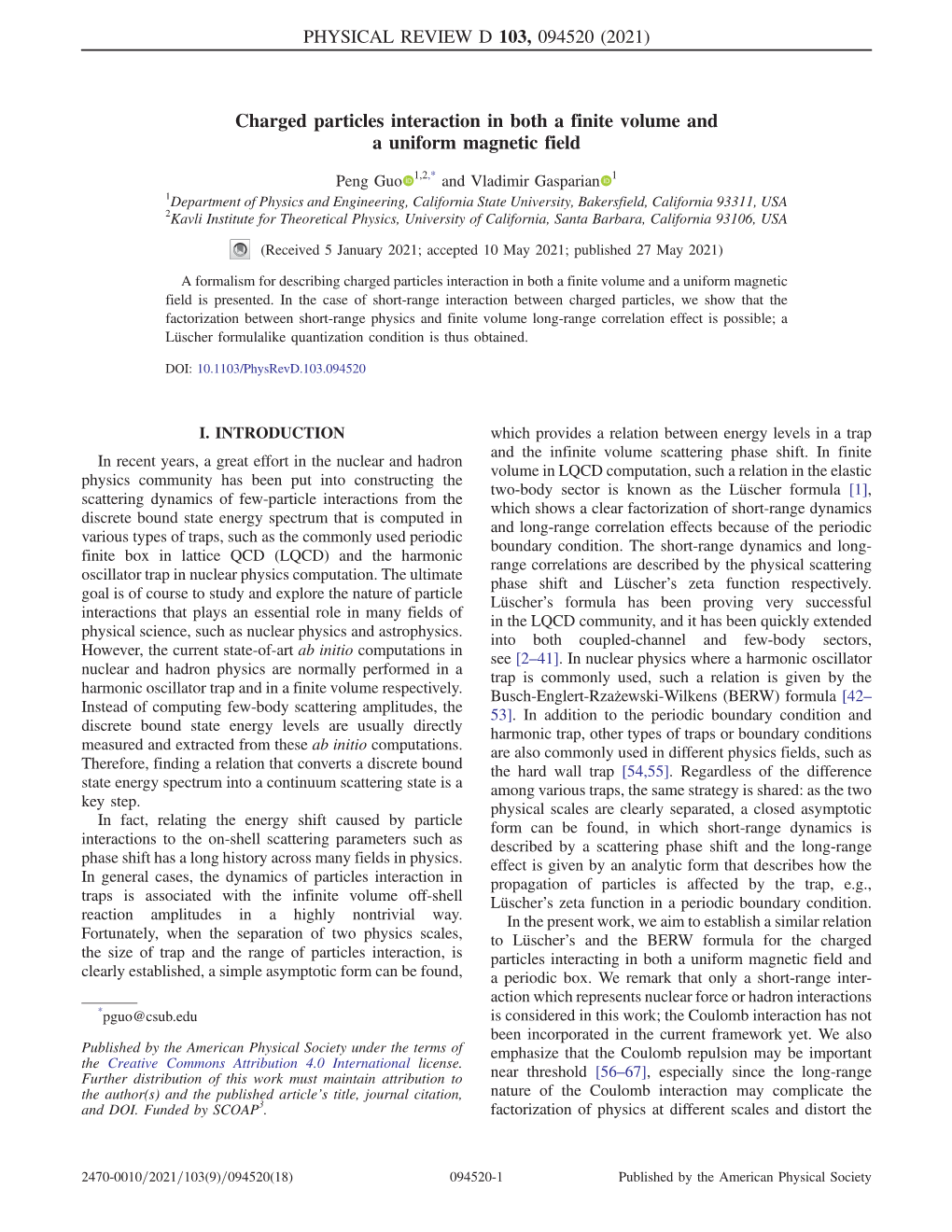 Charged Particles Interaction in Both a Finite Volume and a Uniform Magnetic Field