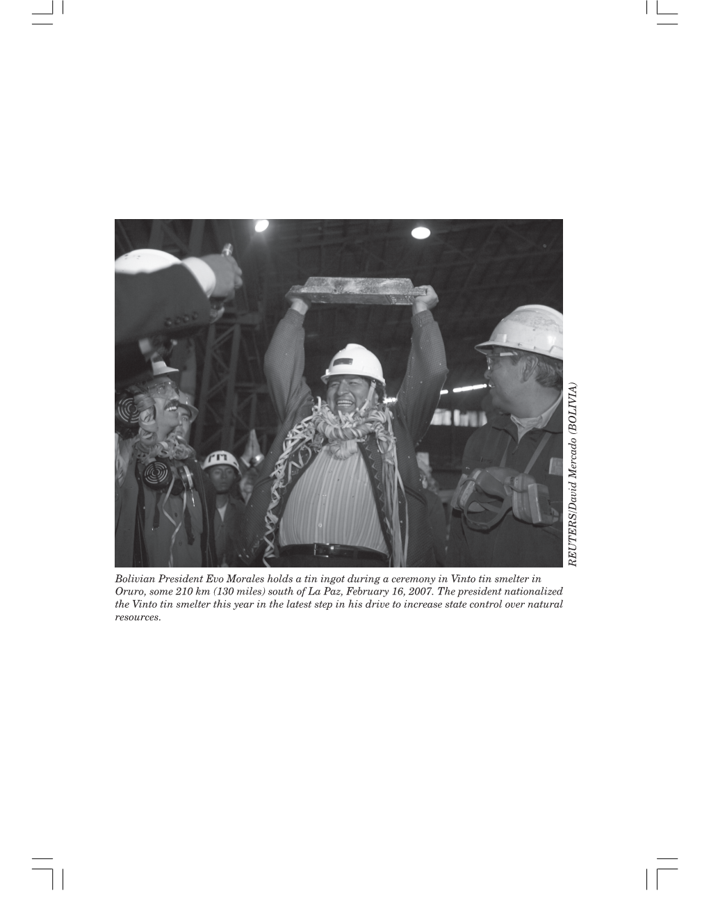 Bolivian President Evo Morales Holds a Tin Ingot During a Ceremony in Vinto Tin Smelter in Oruro, Some 210 Km (130 Miles) South of La Paz, February 16, 2007