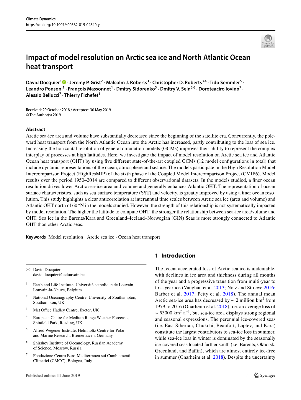 Impact of Model Resolution on Arctic Sea Ice and North Atlantic Ocean Heat Transport
