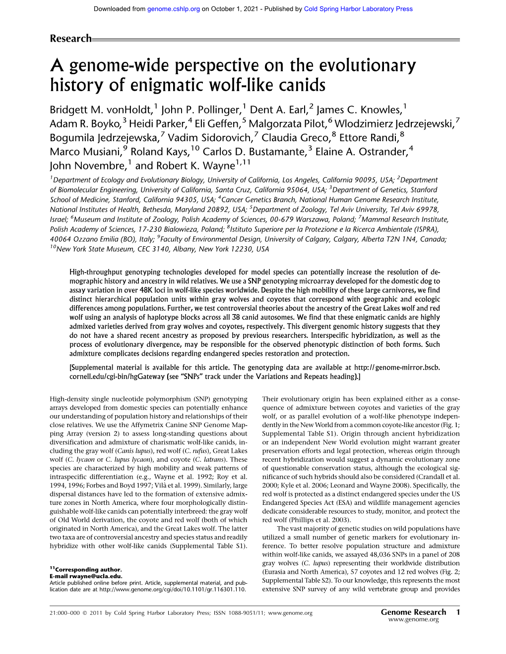 A Genome-Wide Perspective on the Evolutionary History of Enigmatic Wolf-Like Canids