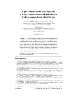 Light-Induced Phase and Amplitude Gratings in Centrosymmetric Gadolinium Gallium Garnet Doped with Calcium